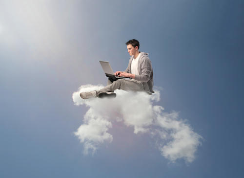 Person sitting on a cloud